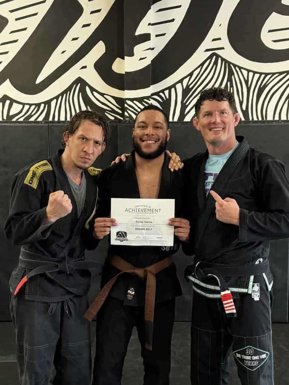  Athletes at SBG Atlanta celebrating their black and brown belt promotions at the Ironman Belt Ceremony.