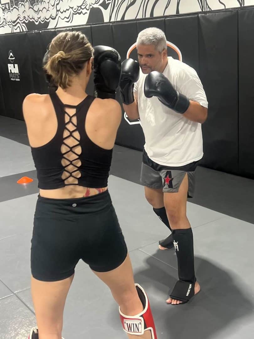 Glen sparring with younger students during open mat training at SBG Atlanta.